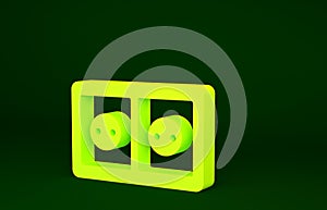 Yellow Electrical outlet icon isolated on green background. Power socket. Rosette symbol. Minimalism concept. 3d