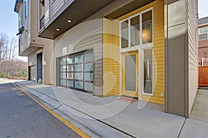 Yellow entrance door of apartment building