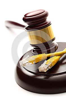 Yellow ethernet cable and gavel