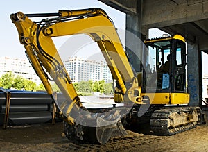 Yellow excavator photo