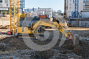 Yellow excavator on Construction site