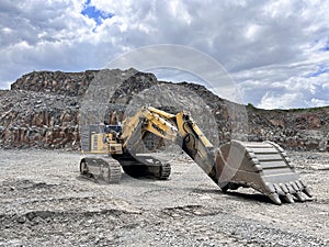 Yellow Excavator in mine