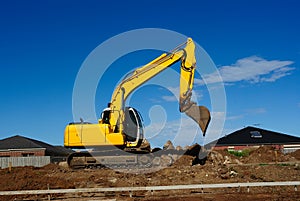 Yellow Excavator At Work