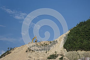 Yellow Excavator at Work