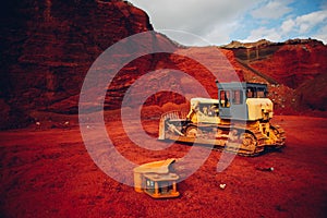 Yellow excavators at red rock quarry