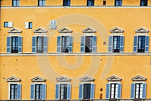 Yellow facade and blue windows