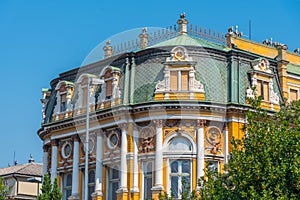 Yellow facade of Modello palace at Rijeka, Croatia photo