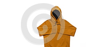 Yellow fashionable men`s sweatshirt with a hood on white background top view. Fashionable male clothing, hoodie, casual youth