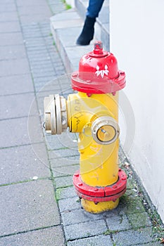 Yellow fire hydrant in street reykjavik iceland. Fire hydrant also called fireplug can tap into water supply. Active