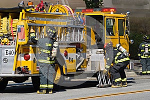 Yellow Fire Truck and Firefighters