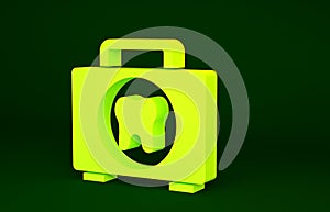 Yellow First aid kit icon isolated on green background. Medical box with cross. Medical equipment for emergency