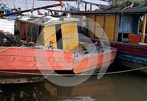 Yellow fishing boat at the river