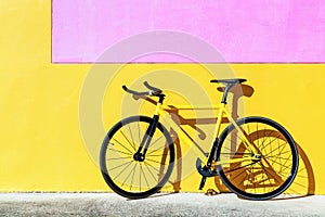 Yellow fixed gear bicycle