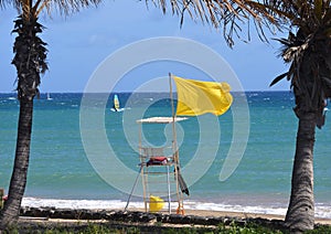 Yellow Flag Flying at Las Cucharas Beach Costa Teguise photo