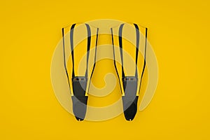 Yellow Flippers isolated on yellow background. 3D rendering