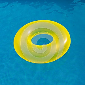 Yellow floater on the pool