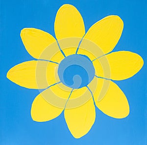 Yellow flower on light blue background