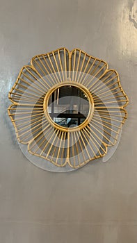 The yellow flower mirror on the wall