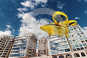 Yellow flying taxi against the sky, city electric transport drone. Car with propellers, clean air, fast ride. Mixed media, copy