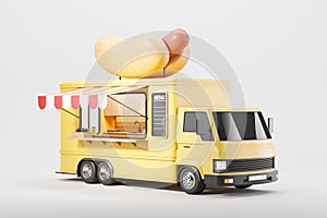 Yellow food truck with kitchen, hot dog decoration. Isolated over grey background