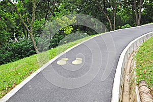 Yellow Footmarks On Pavement