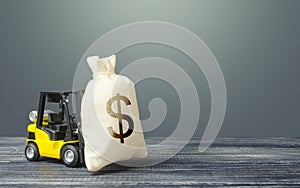 Yellow forklift carries a dollar money bag. Tax payment. Payment of taxes. Big contract, profitable deposit, take a loan. Wealth,