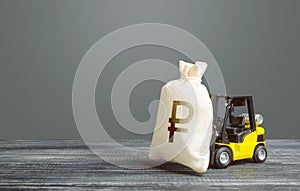 Yellow forklift carries a russian ruble money bag. Big contract, profitable deposit, take a loan. Inflation, price increases.