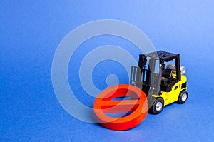 A yellow forklift truck cannot lift a red NO symbol. The concept of prohibition, sanctions and restrictions. Overcoming, bypassing