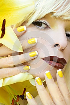 Yellow French manicure.