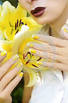 Yellow French manicure.