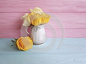 Yellow fresh rose vase wooden background frame nature greeting decoration