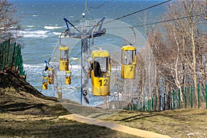 Yellow funicular, suspension road moving from the mountain to the Baltic sea.