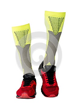 Yellow gaiters in red sneakers