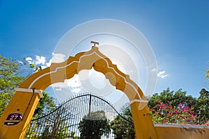 Yellow gate in Izamal, Mexico