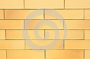 Yellow German Ceramic Clinker Brick Textured Wall Background photo