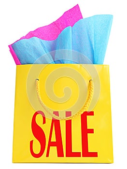 Yellow gift bag with red SALE superscription photo