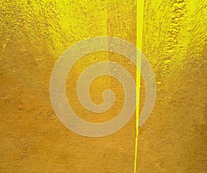 Yellow gloss paint plaster background