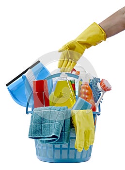 Yellow Gloved Hand Reaching for Basket of Cleaning Products