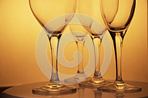 Gold drinking wine champagne luxury glasses on food dining table celebrate and party background