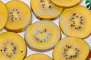 Yellow or gold kiwi fruits closeup.
