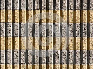 Yellow and gray bricks wall