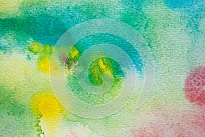 Yellow, green and blue watercolor brush strokes. Background for design. Colorful hand painted watercolor background.
