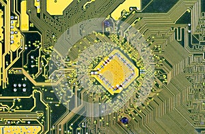 Yellow green computer circuit board PCB motherboard abstract background texture, backdrop, object structure detail, closeup