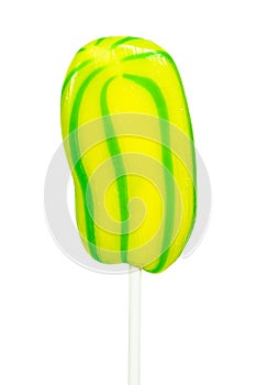 Yellow-green lollipop on white background