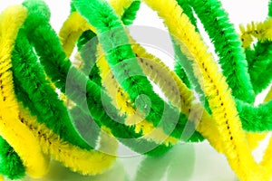 Yellow and green pipe cleaners