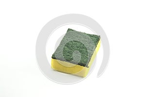 Yellow and green scrub sponge used on white background