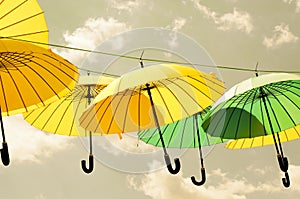 Yellow and green umbrellas.