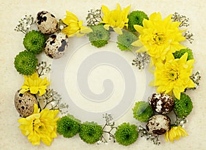 Yellow, green and white flowers with quail eggs on old paper