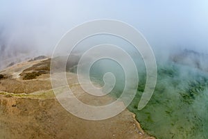 Yellow ground and green water on the volcano in Rupite, Bulgaria