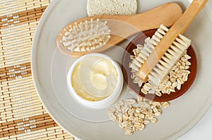 Yellow hair mask banana face cream, shea butter facial mask, body butter in the small white jar, oatmeal, massage body brush